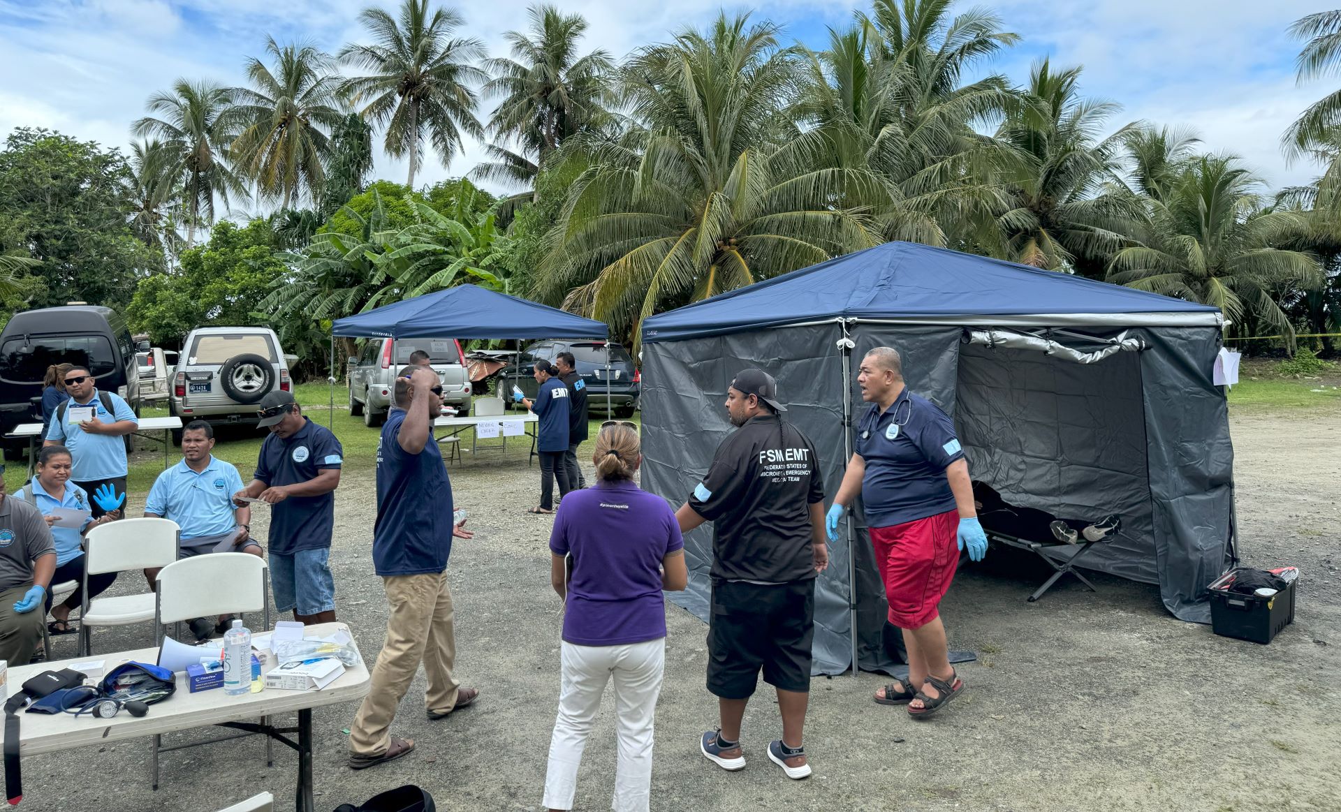 Emergency medical teams practice a training session outside